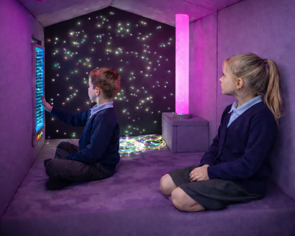 Image of a sensory room with a variety of sensory equipment