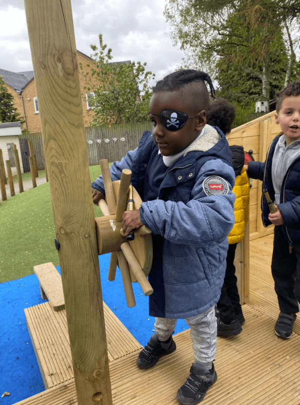 Themed playground equipment for imaginative play