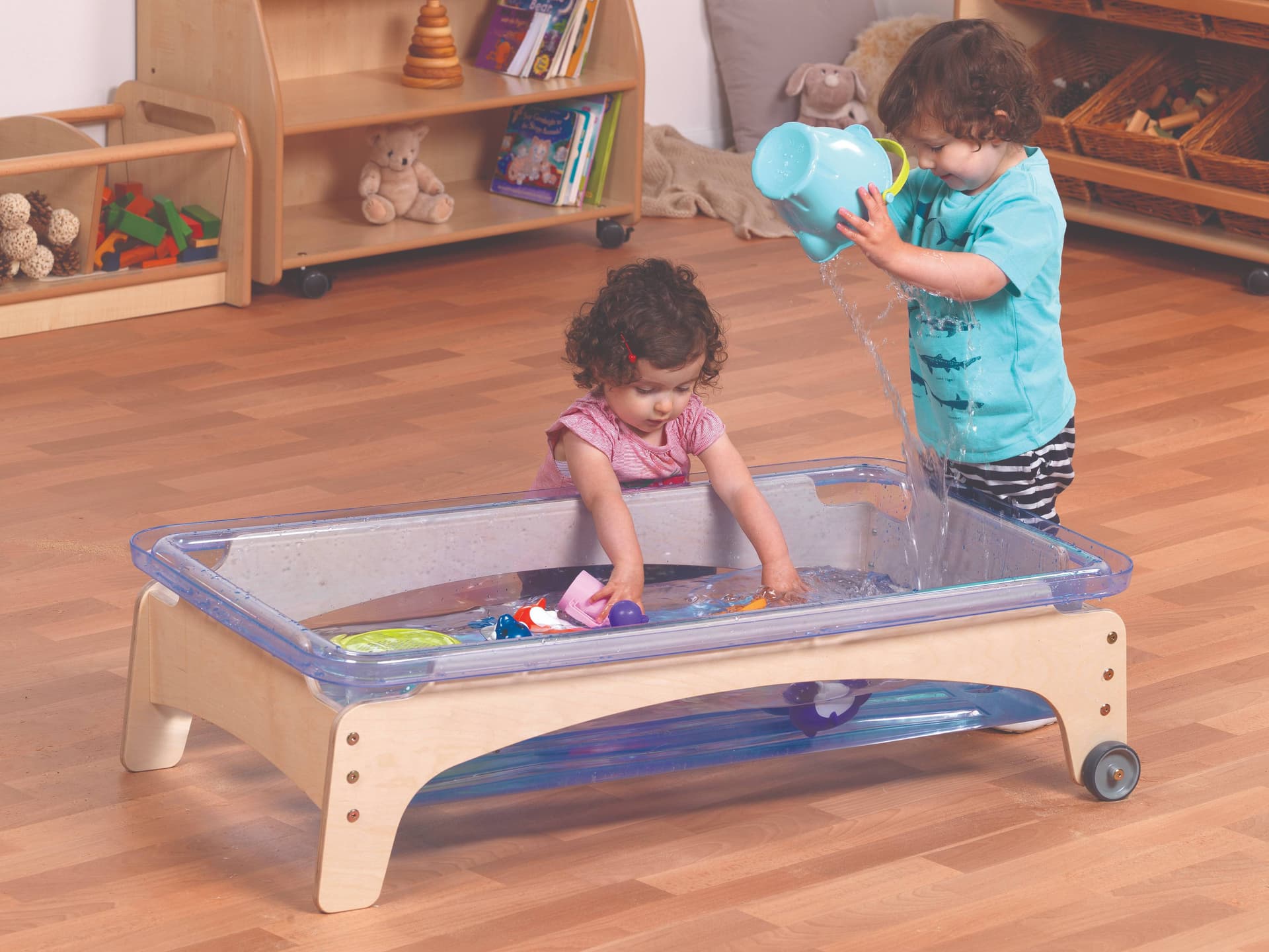 The Sand and Water Station is compact and low-level making it suitable for all settings