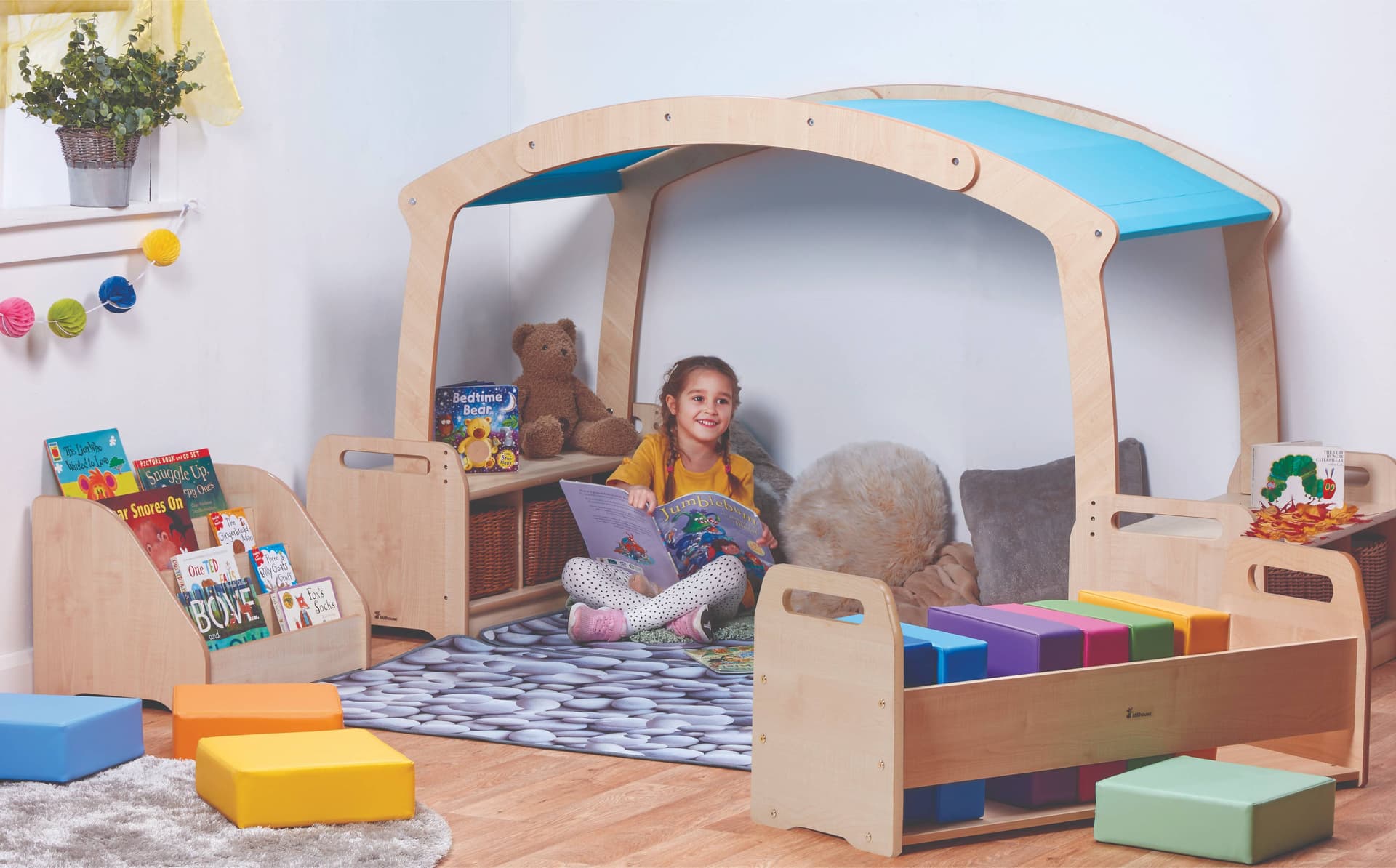 The Mini Rainbow Reading Zone can create a colourful space for children to read or play quietly