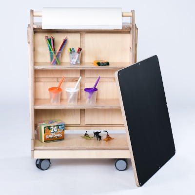 paint and drawing accessories stored inside art easel