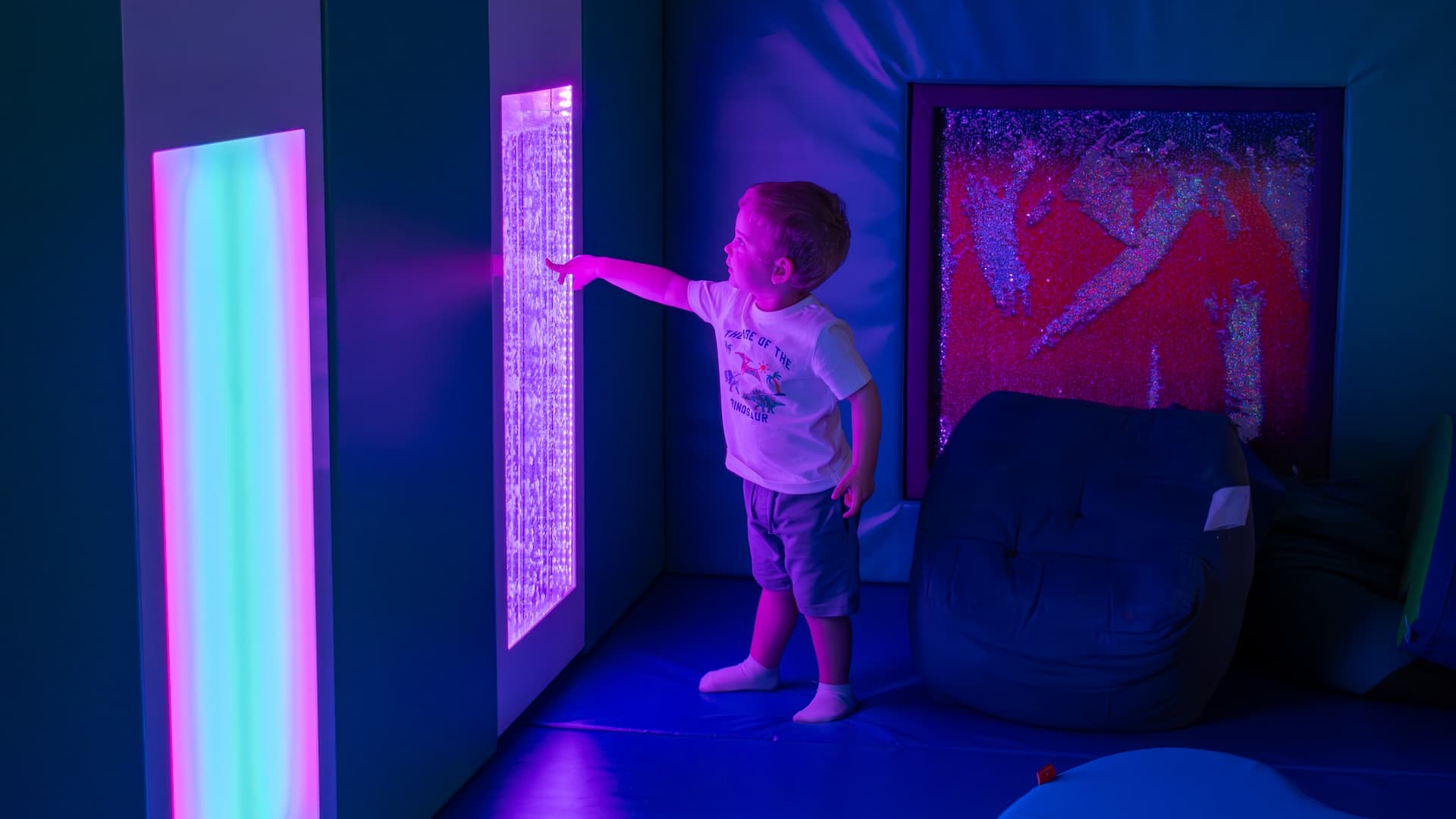 Image of a sensory room with a variety of sensory equipment