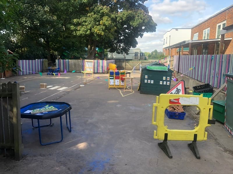 old tarmac playground equipment with freestanding equipment